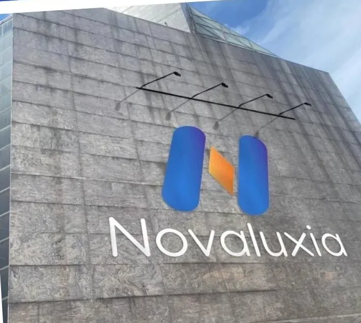The Novaluxia PH office building in Makati with the company sign over the entrance, a published address you can visit